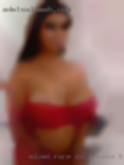 Mixed race, voluptuous bi-swinging buxom woman.